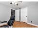 Well lit office featuring wood floors, neutral decor and a comfortable chair at 28 Mcevers Branch Ct, Acworth, GA 30101