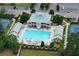 Image features a large outdoor swimming pool with ample seating and well-maintained landscaping at 28 Mcevers Branch Ct, Acworth, GA 30101