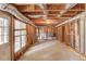 Unfinished basement with exposed ducts, beams, and windows at 3082 Biltmore Woods Dr, Buford, GA 30519