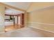 Open-concept living space showcases the kitchen and a seamless flow for entertaining guests at 3082 Biltmore Woods Dr, Buford, GA 30519