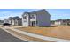 Attractive two-story home showcases a tidy lawn, attached two-car garage, and contemporary design elements at 8593 Secretariat Drive, Lithonia, GA 30058