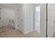 Hallway area with laundry room and bedroom at 8593 Secretariat Drive, Lithonia, GA 30058