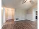 Neutral living room featuring hardwood floors, gray walls, and a front door entrance at 20 Rosebud Ln, Mcdonough, GA 30253