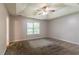 Spacious main bedroom with a large window that offers plenty of natural light at 20 Rosebud Ln, Mcdonough, GA 30253