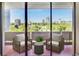 Relaxing outdoor balcony area with comfortable seating and city skyline views at 2575 Peachtree Ne Rd # 15G, Atlanta, GA 30305