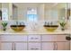 Bathroom with double vanity, vessel sinks, marble countertops, and modern fixtures at 2575 Peachtree Ne Rd # 15G, Atlanta, GA 30305