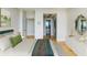 Bright bedroom with wood floors leads to ensuite bathroom and spacious closet at 2575 Peachtree Ne Rd # 15G, Atlanta, GA 30305