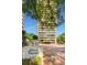 Exterior view of Plaza Towers with beautiful landscaping and a welcoming entrance at 2575 Peachtree Ne Rd # 15G, Atlanta, GA 30305