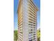 Striking exterior of a high-rise condo building showing balconies and architectural details at 2575 Peachtree Ne Rd # 15G, Atlanta, GA 30305
