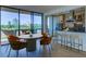 Open-concept dining and kitchen area with a view at 2575 Peachtree Ne Rd # 15G, Atlanta, GA 30305