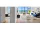Stylishly furnished living room offering abundant natural light and an open floor plan at 2575 Peachtree Ne Rd # 15G, Atlanta, GA 30305