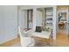 Bright office space featuring built-in closets, a modern desk, and hardwood floors at 2575 Peachtree Ne Rd # 15G, Atlanta, GA 30305