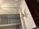 Bathroom featuring modern white vanity, updated fixtures, and a glass-enclosed shower at 1629 Marsanne Ter, Kennesaw, GA 30152