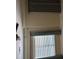 Bedroom featuring a fan, two windows with blinds, and neutral decor at 1629 Marsanne Ter, Kennesaw, GA 30152