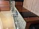 Modern kitchen with granite countertops, stainless steel sink, and dark wood cabinets at 1629 Marsanne Ter, Kennesaw, GA 30152