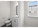 Clean, well-lit powder room with modern fixtures and a neutral color palette at 3382 Monarch Ave, Duluth, GA 30096