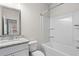 Neutral bathroom featuring a vanity and shower/tub combo with white fixtures at 3382 Monarch Ave, Duluth, GA 30096