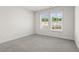 Spacious bedroom featuring neutral carpet and lots of natural light at 3382 Monarch Ave, Duluth, GA 30096