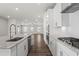 Modern kitchen featuring granite countertops, stainless steel appliances, and open-concept design at 3382 Monarch Ave, Duluth, GA 30096