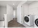 Convenient laundry room with modern appliances and ample storage space at 3382 Monarch Ave, Duluth, GA 30096