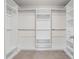 Organized walk-in closet with shelving, rods, and ample storage space at 3382 Monarch Ave, Duluth, GA 30096