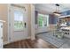 Bright dining area with natural light and an adjacent door at 3392 Fall Branch Ln, Buford, GA 30519