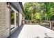 Spacious deck with access to the house through elegant glass doors, ideal for entertaining at 3122 Vandiver Dr, Marietta, GA 30066