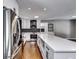 Modern kitchen with a long island, stainless steel appliances, and plenty of counter space at 3122 Vandiver Dr, Marietta, GA 30066