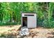 Modern backyard shed with a sleek design offering additional storage space at 3122 Vandiver Dr, Marietta, GA 30066
