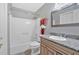 Bathroom with granite countertop vanity and shower/tub combo at 3473 Whisperwood Nw Ct, Marietta, GA 30064