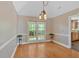 Elegant dining room with hardwood floors and ample natural light at 3473 Whisperwood Nw Ct, Marietta, GA 30064