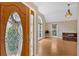 Inviting entryway with decorative glass door and view into the spacious living area at 3473 Whisperwood Nw Ct, Marietta, GA 30064