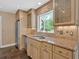 Well-lit kitchen boasts granite countertops, stainless steel appliances, and ample cabinet space at 3473 Whisperwood Nw Ct, Marietta, GA 30064