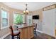 Bright eat-in kitchen with granite countertops, stainless steel appliances, and a large window at 3473 Whisperwood Nw Ct, Marietta, GA 30064