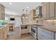 The kitchen features custom cabinets, stainless steel appliances, and a cozy breakfast nook at 3473 Whisperwood Nw Ct, Marietta, GA 30064