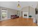 Comfortable living room with fireplace, vaulted ceiling, and natural light at 3473 Whisperwood Nw Ct, Marietta, GA 30064