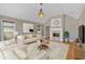 Bright living room with vaulted ceiling, fireplace, and modern decor at 3473 Whisperwood Nw Ct, Marietta, GA 30064