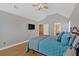 Spacious main bedroom with vaulted ceiling, TV, and hardwood floors at 3473 Whisperwood Nw Ct, Marietta, GA 30064
