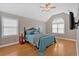 Serene main bedroom with vaulted ceilings, hardwood floors, and large windows at 3473 Whisperwood Nw Ct, Marietta, GA 30064