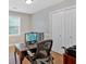 Office with wood desk, monitor, and closet at 3473 Whisperwood Nw Ct, Marietta, GA 30064