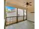 Spacious screened porch with ceiling fan at 3473 Whisperwood Nw Ct, Marietta, GA 30064