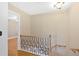 Staircase landing showcasing wrought iron railing at 3473 Whisperwood Nw Ct, Marietta, GA 30064