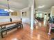 Bright dining room with hardwood floors, decorative trim, and an open layout at 827 Autry Oak Ct, Johns Creek, GA 30022