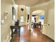 Welcoming foyer with hardwood floors and an open view of the formal dining room at 827 Autry Oak Ct, Johns Creek, GA 30022