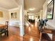 Spacious, open-concept living area featuring hardwood floors and elegant trim work at 827 Autry Oak Ct, Johns Creek, GA 30022