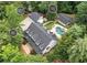 Aerial view of the property featuring a main house, guest house, and detached garage at 1824 Mount Paran Nw Rd, Atlanta, GA 30327