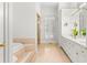 Bright bathroom featuring double vanity and tub at 1824 Mount Paran Nw Rd, Atlanta, GA 30327