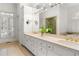 Bathroom featuring double vanity, natural lighting and shower at 1824 Mount Paran Nw Rd, Atlanta, GA 30327