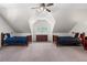 Large bedroom with vaulted ceilings, two beds, and natural light at 1824 Mount Paran Nw Rd, Atlanta, GA 30327