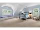 Bedroom featuring sky blue walls, a window bench and a black metal bed frame at 1824 Mount Paran Nw Rd, Atlanta, GA 30327